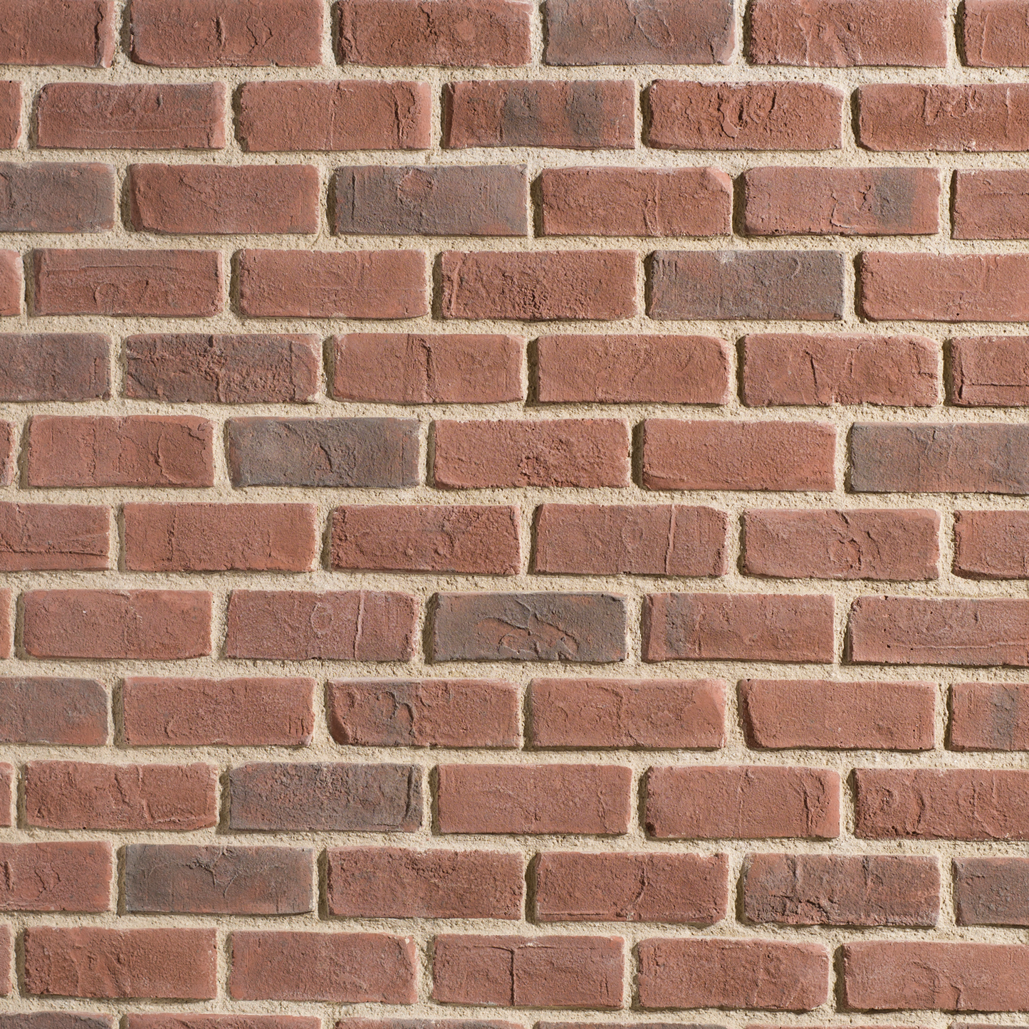 Red brick wall pattern with textured reddish-brown bricks and light beige mortar lines.