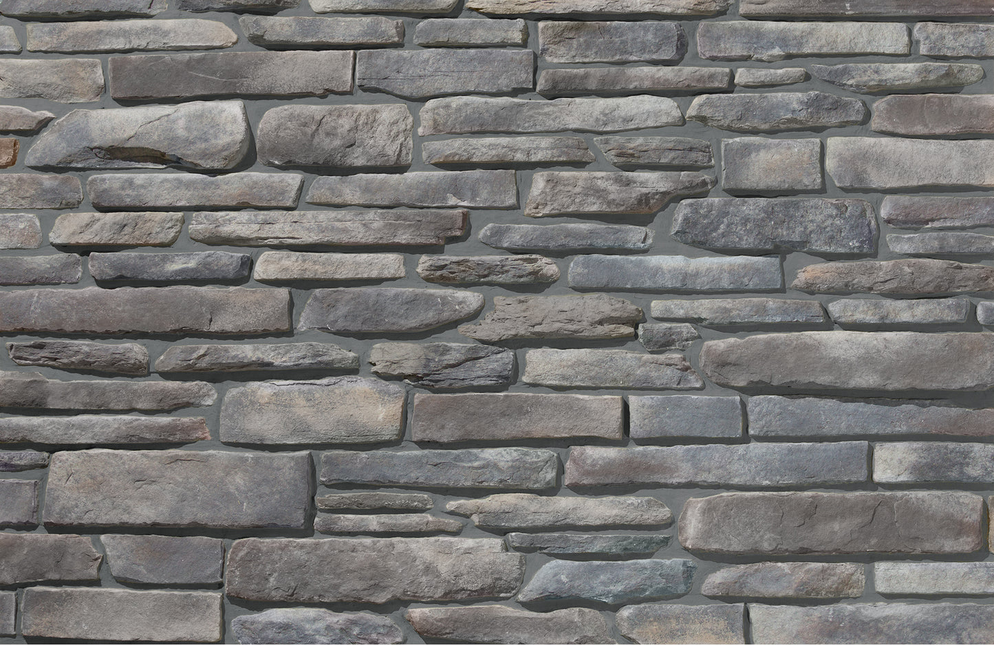 Pattern of stacked stone tiles in various shades of gray.