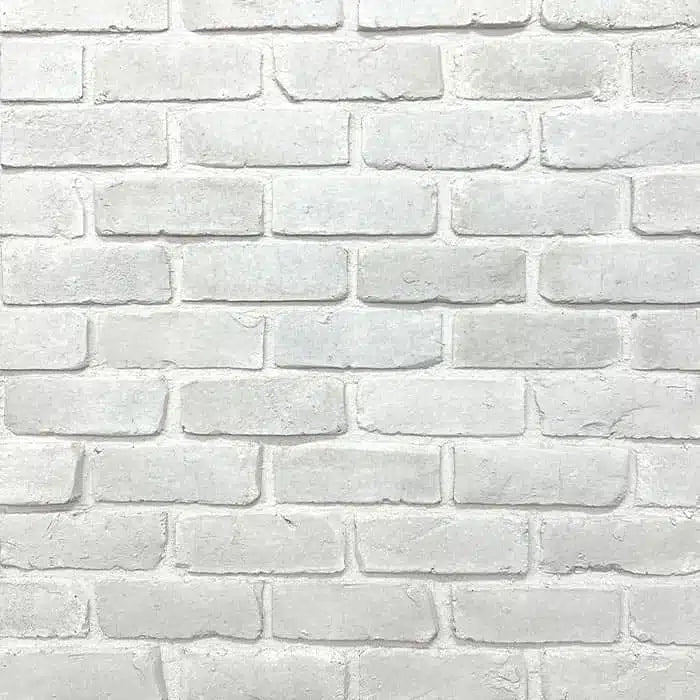 Casa Di Sassi Niveo 1-inch brick veneer featuring warm off-white tones, slim linear brick format, and refined modern texture.