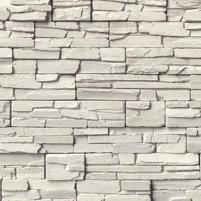 Casa Di Sassi Niveo Kwik Stack veneer featuring soft off-white stone tones, layered stacked stone profile, and clean modern architectural texture.
