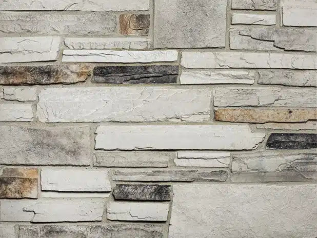 Casa Di Sassi Osso Quartz Ledgestone veneer featuring warm bone-toned quartz stone colors, linear stacked ledgestone profile, and refined architectural texture.