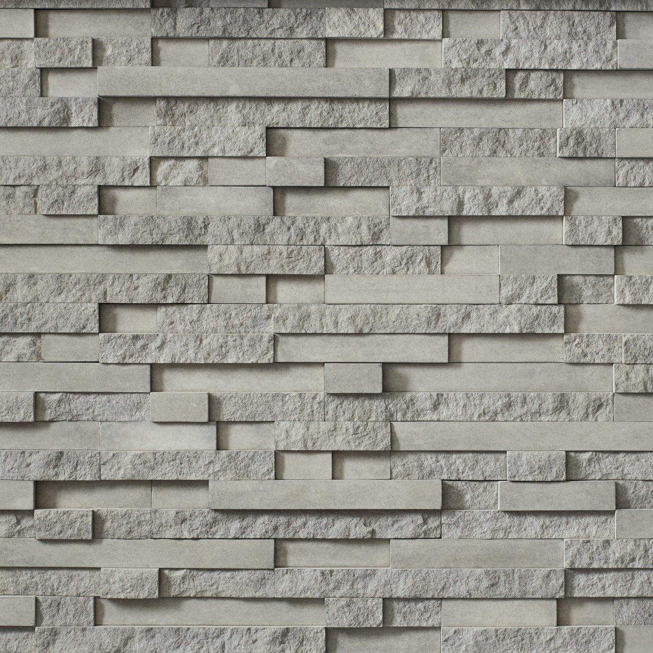 Cultured Stone Arcadia Pro-Fit Terrain Ledgestone veneer featuring warm tan and brown tones, rugged terrain texture, and natural stone depth.