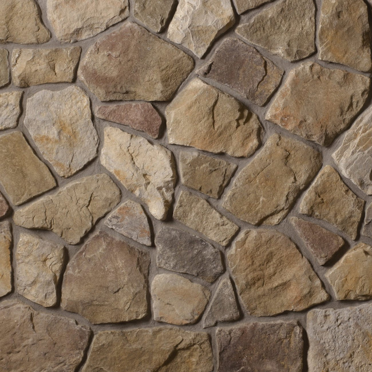 Cultured Stone Bucks County Dressed Fieldstone veneer featuring warm traditional tones, chiseled dressed texture, and authentic natural stone character.