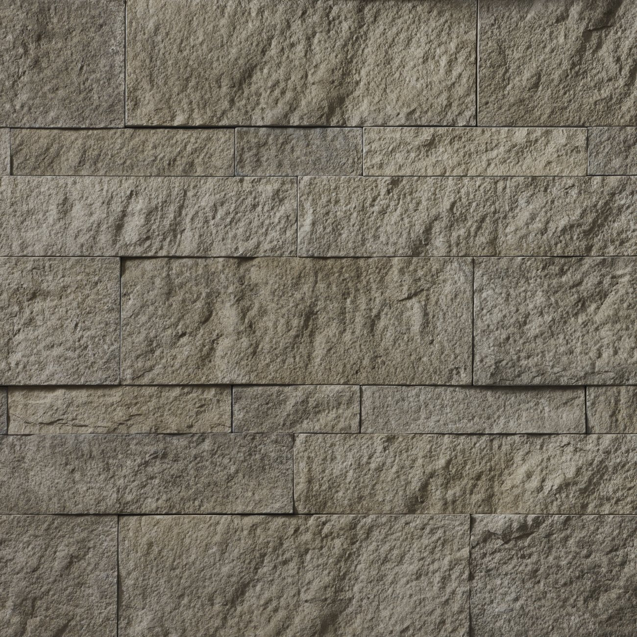 Cultured Stone Talus Hewn Stone veneer featuring rugged earth tones, chiseled hewn texture, and authentic natural stone character