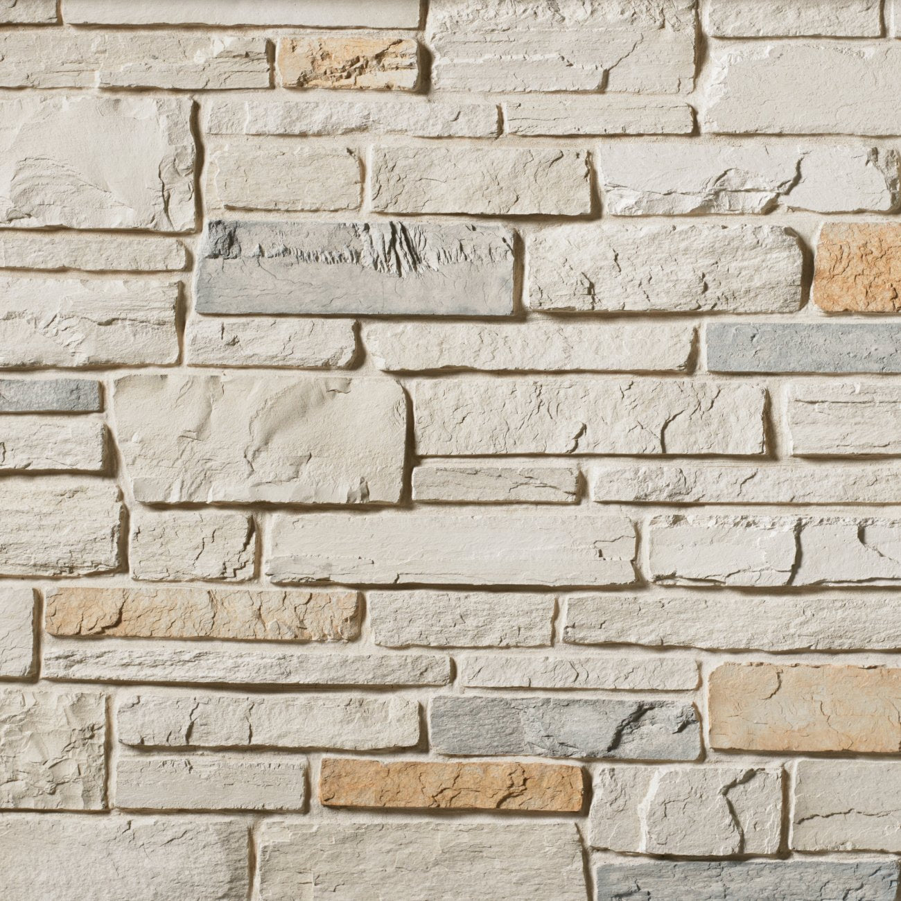 Cultured Stone White Oak Country Ledgestone veneer featuring soft neutral tones, layered stacked texture, and rugged natural stone character.