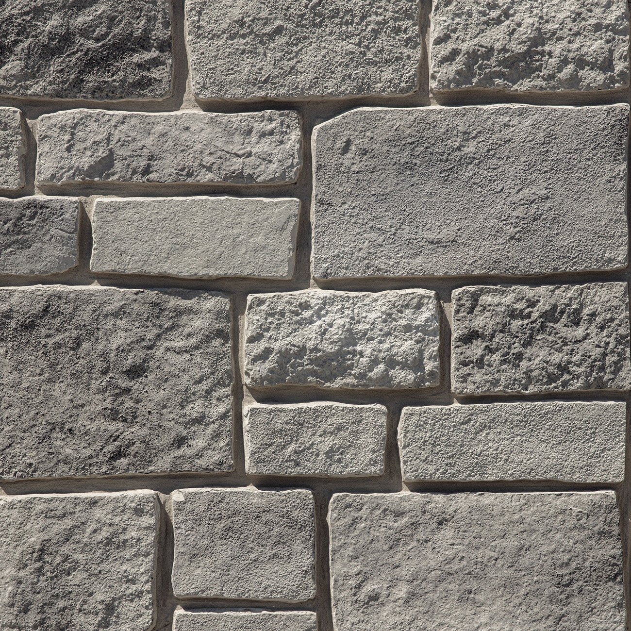 Dutch Quality Greystone Rough Ashlar veneer featuring cool gray tones, rough split-face texture, and classic ashlar stone pattern