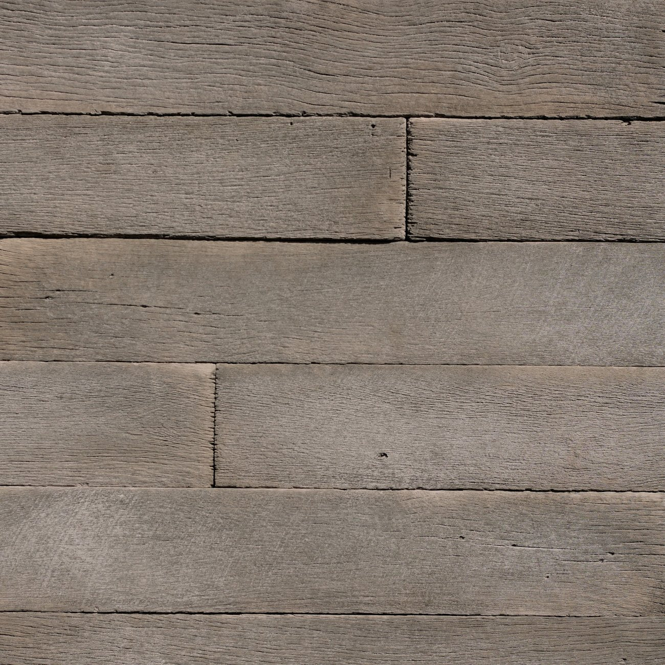 Dutch Quality 6" Industrial Grey Weathered Plank veneer featuring cool gray tones, linear weathered texture, and modern plank-style stone profile.