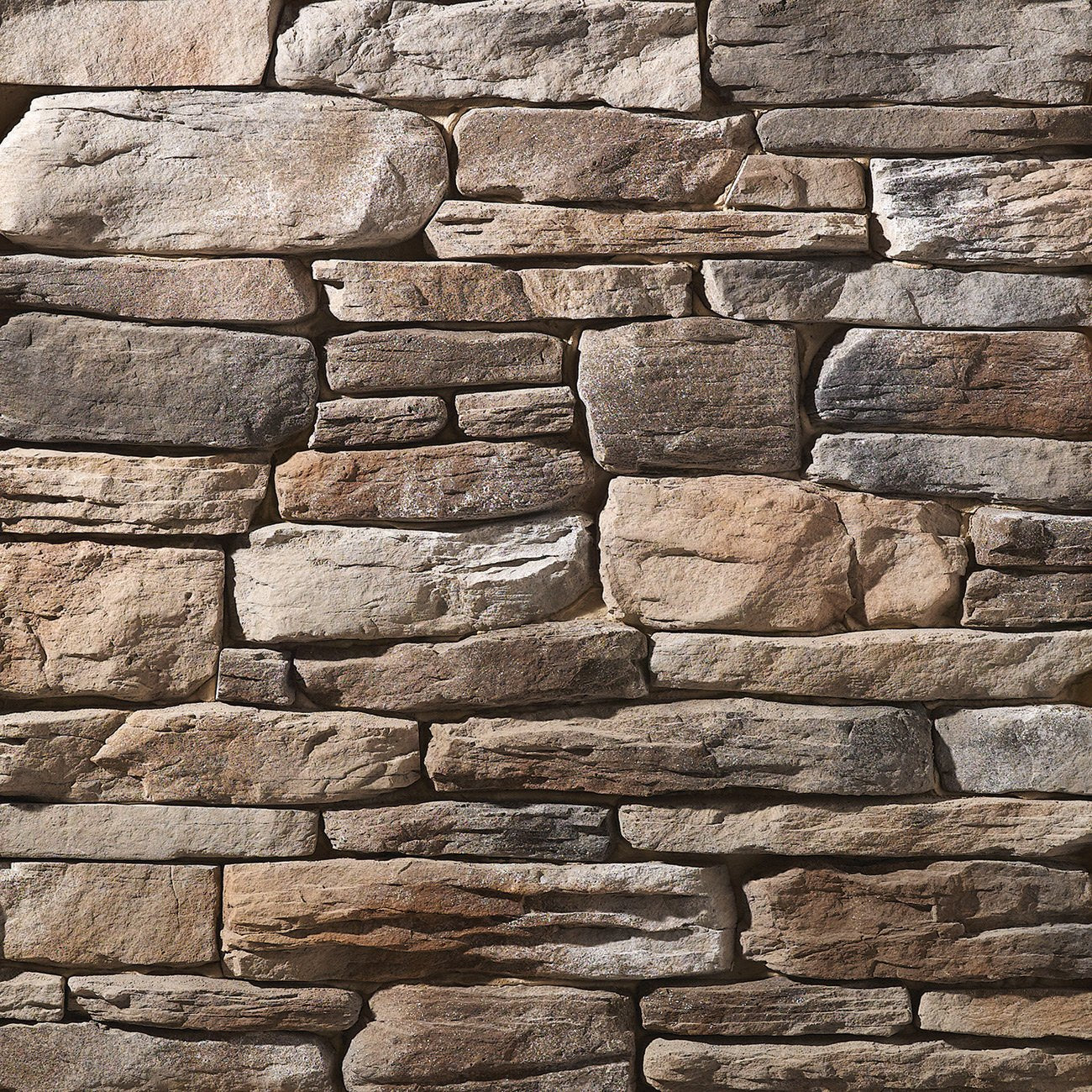 Dutch Quality Sienna Ledgestone veneer featuring warm sienna and brown tones, layered split-face texture, and rugged natural stone character.