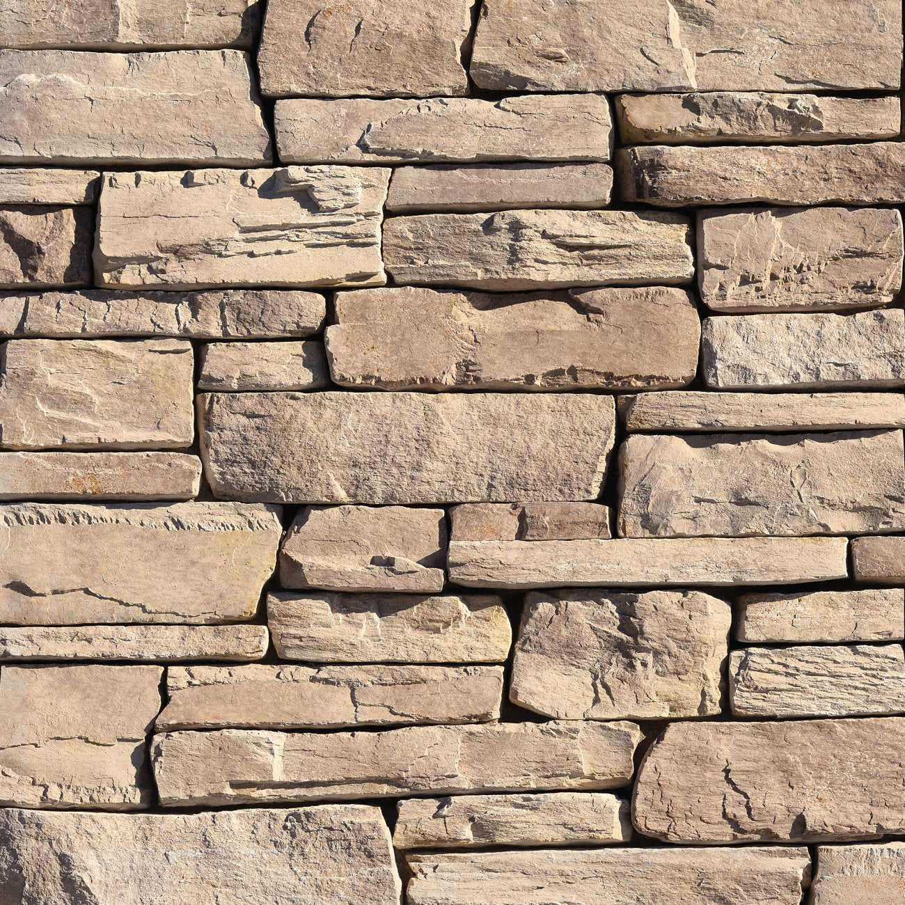 Eldorado Barley Cliffstone stone veneer in warm tan and golden tones with natural ledgestone texture