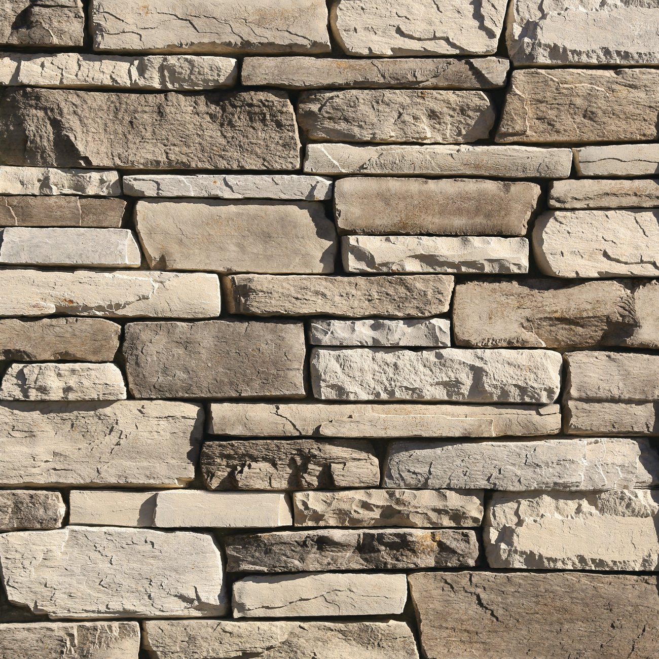 Eldorado Boardwalk Cliffstone stone veneer in soft gray and taupe tones with natural ledgestone texture
