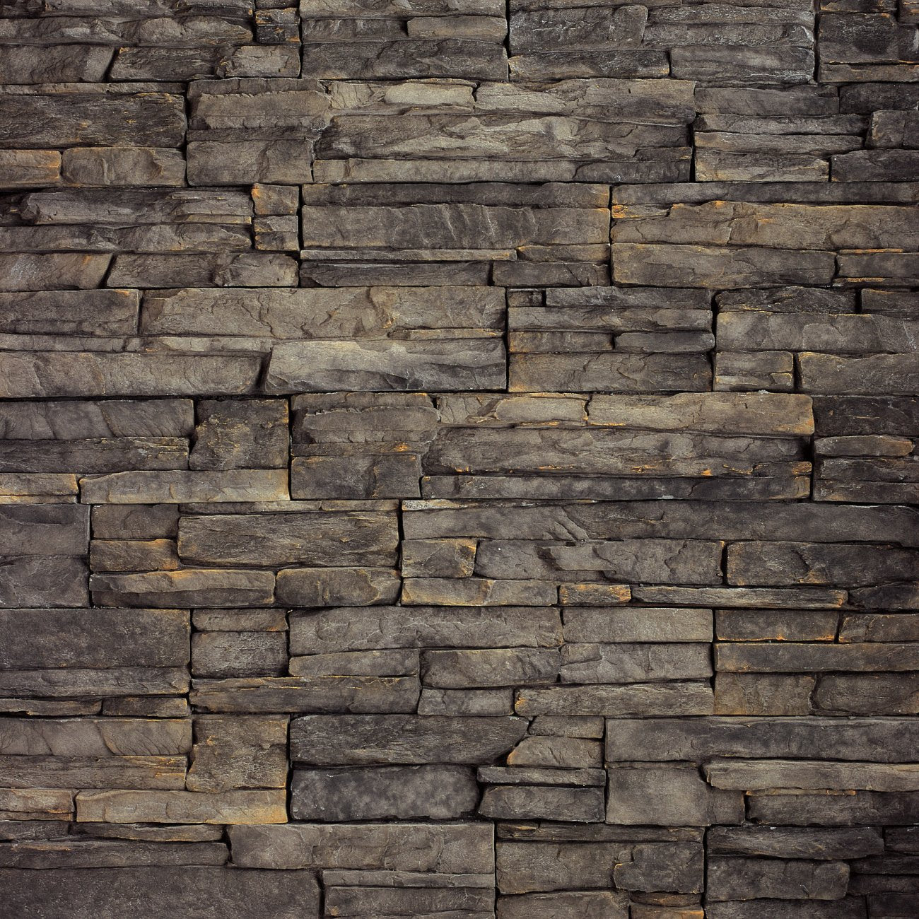 Eldorado Chapel Hill Stacked Stone with tightly fitted linear stones in warm brown, tan, and muted gray tones