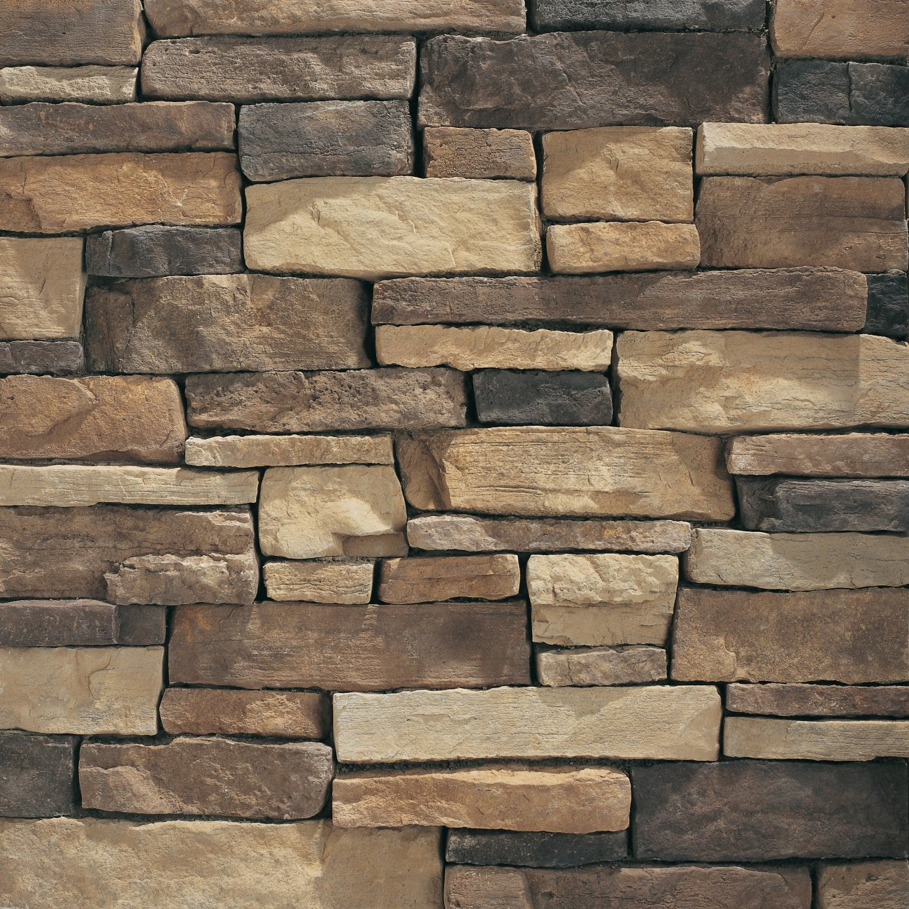 Eldorado Durango Mountain Ledge rugged ledgestone with deep browns, grays, and warm earth tones
