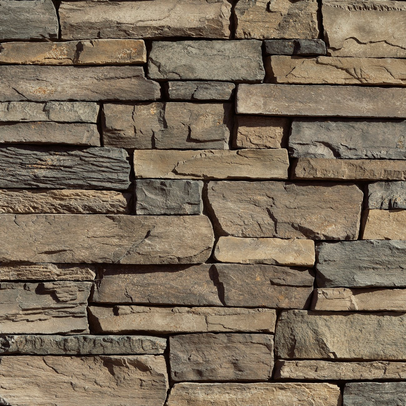 Eldorado Lantana Cliffstone stone veneer in warm golden and rust tones with natural ledgestone texture