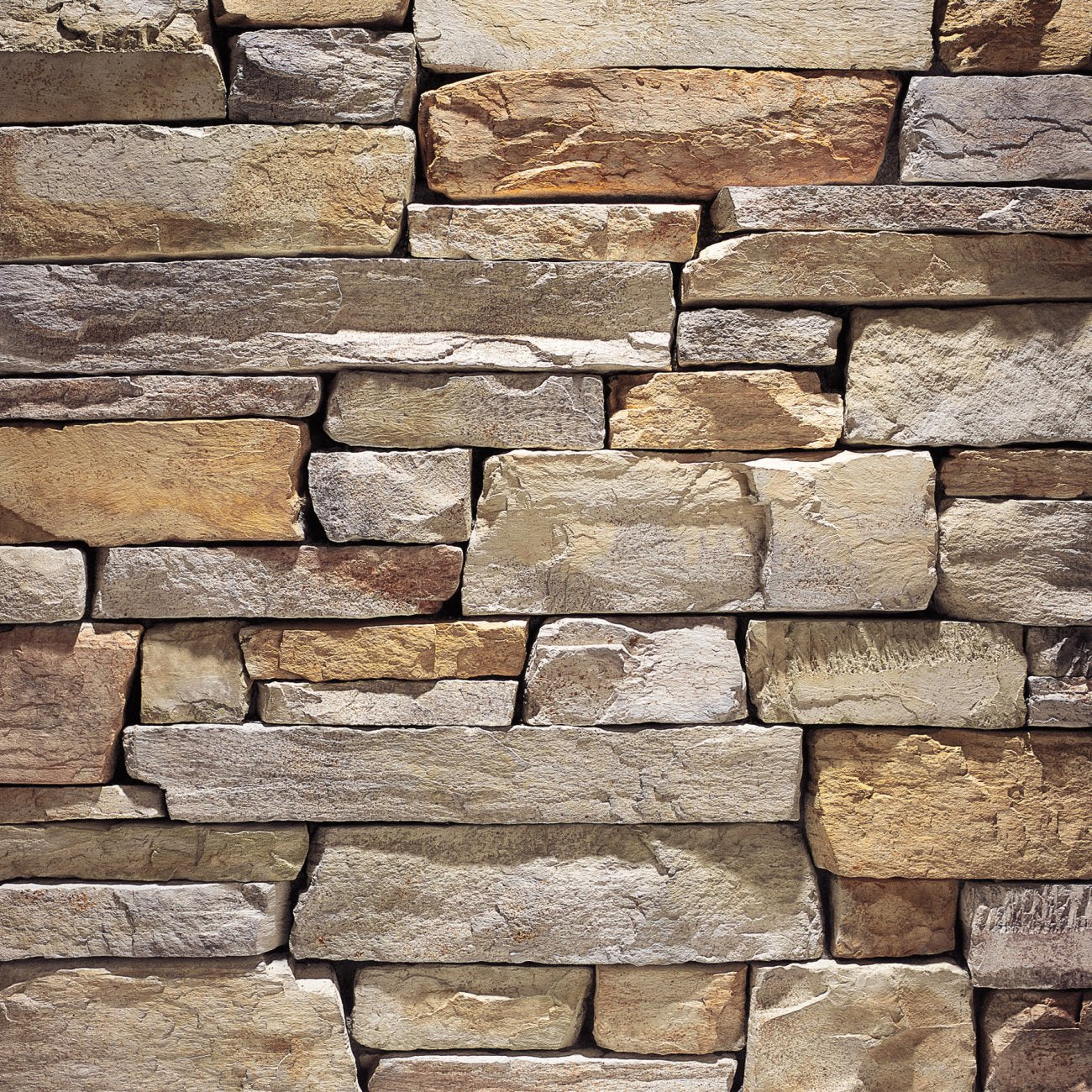 Eldorado Mesquite Cliffstone stone veneer in warm brown and golden hues with natural ledgestone texture
