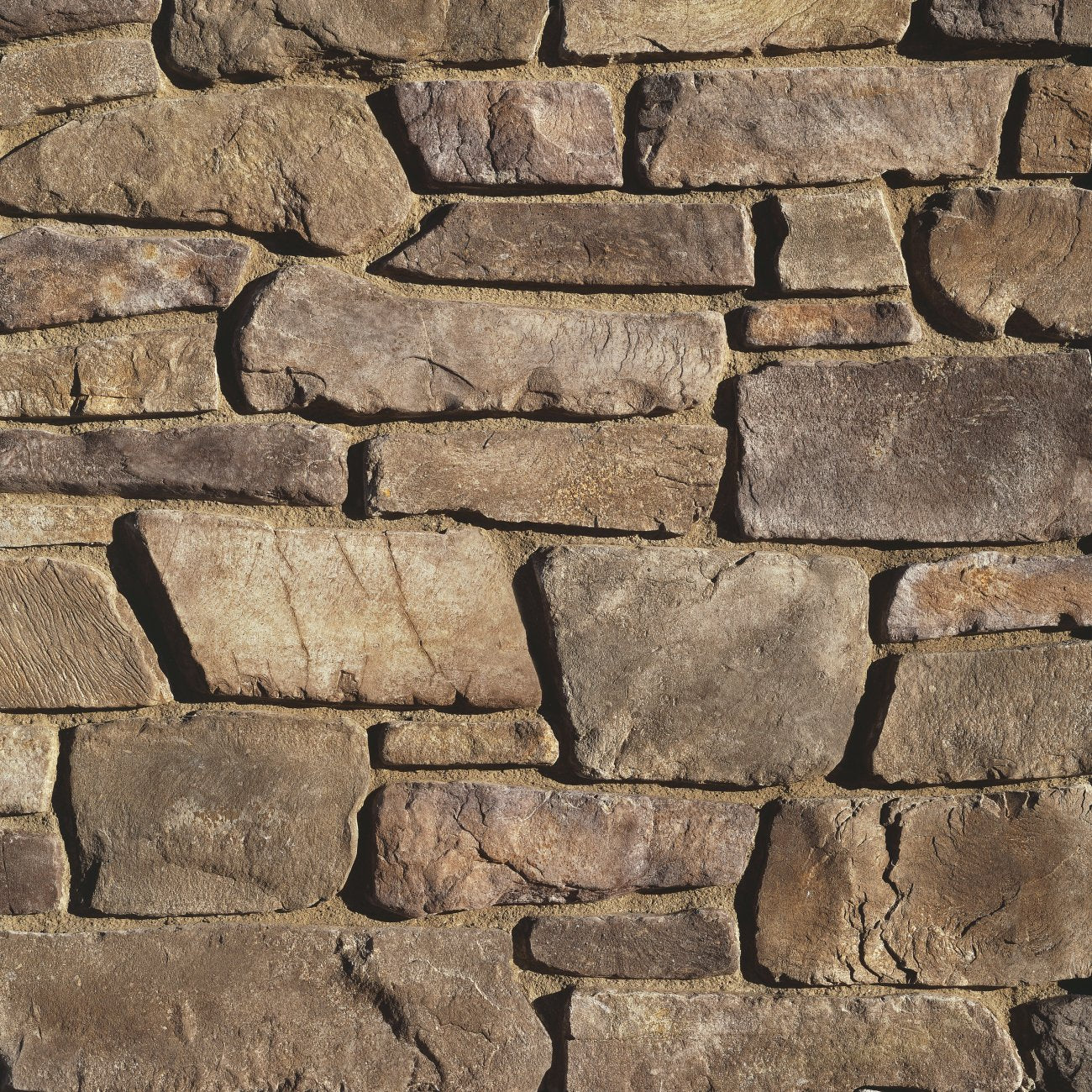Eldorado Padova Fieldledge stone veneer in warm brown and tan tones with rugged, weathered fieldstone texture