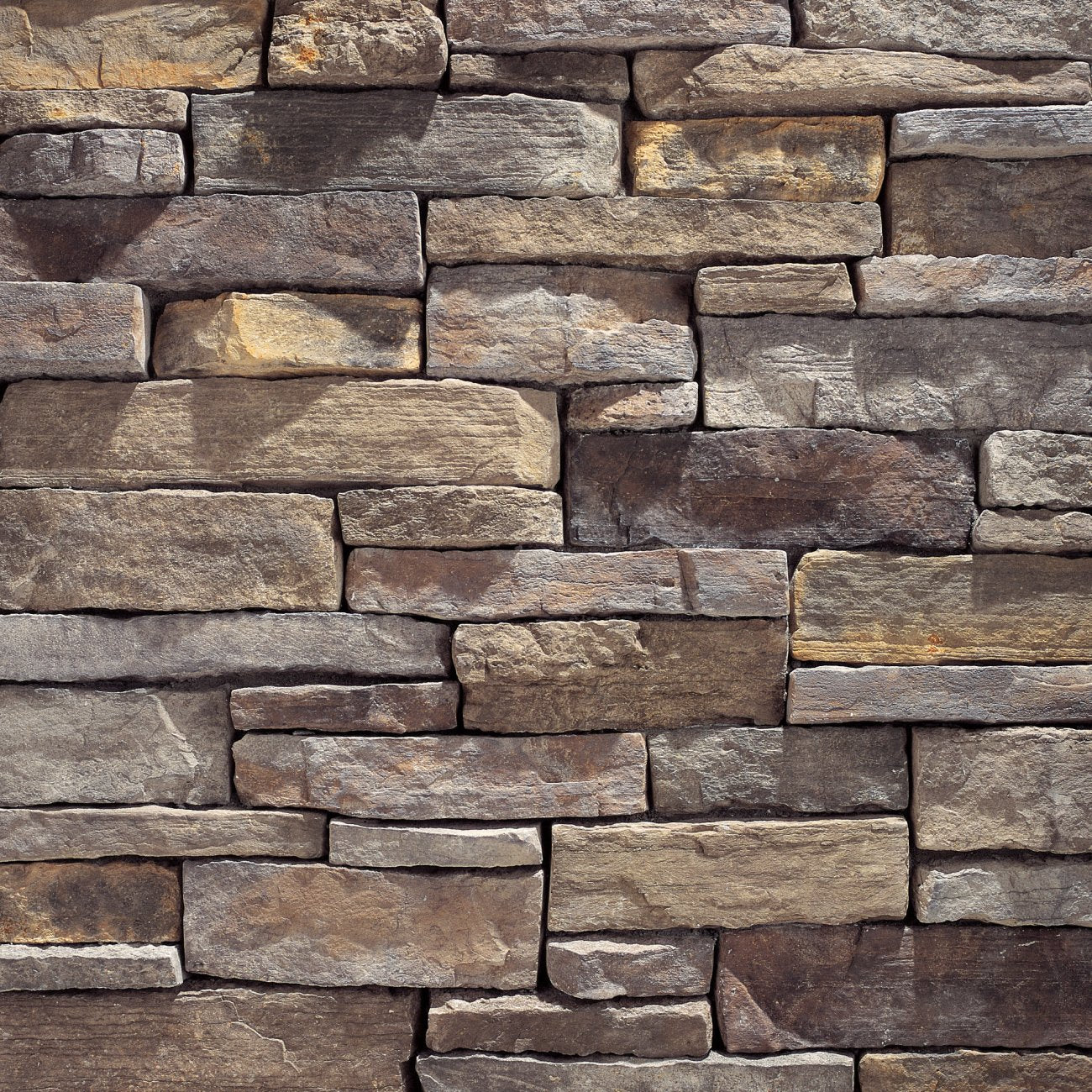 Eldorado Sierra Mountain Ledge stone in warm tan, brown, and gray tones with rugged, hand-split texture