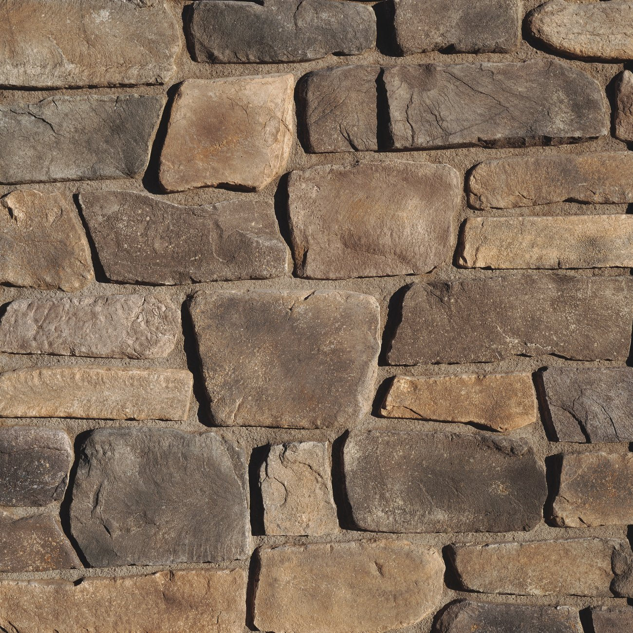 Eldorado Veneto Fieldledge stone veneer in soft gray and taupe tones with rugged, weathered fieldstone texture