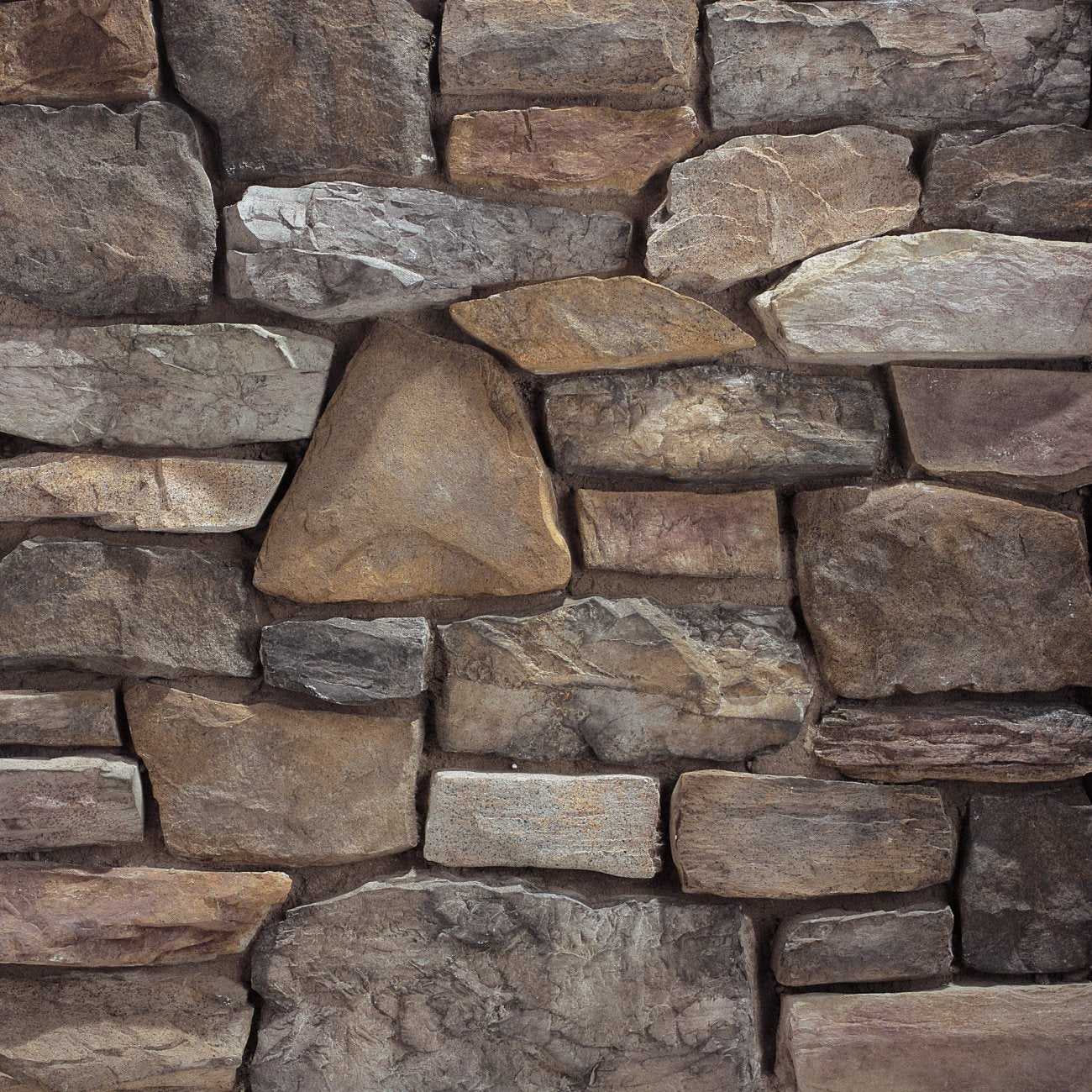 Eldorado Verona Hillstone features warm earth tones and rugged, weathered textures for an authentic old-world stone veneer look.