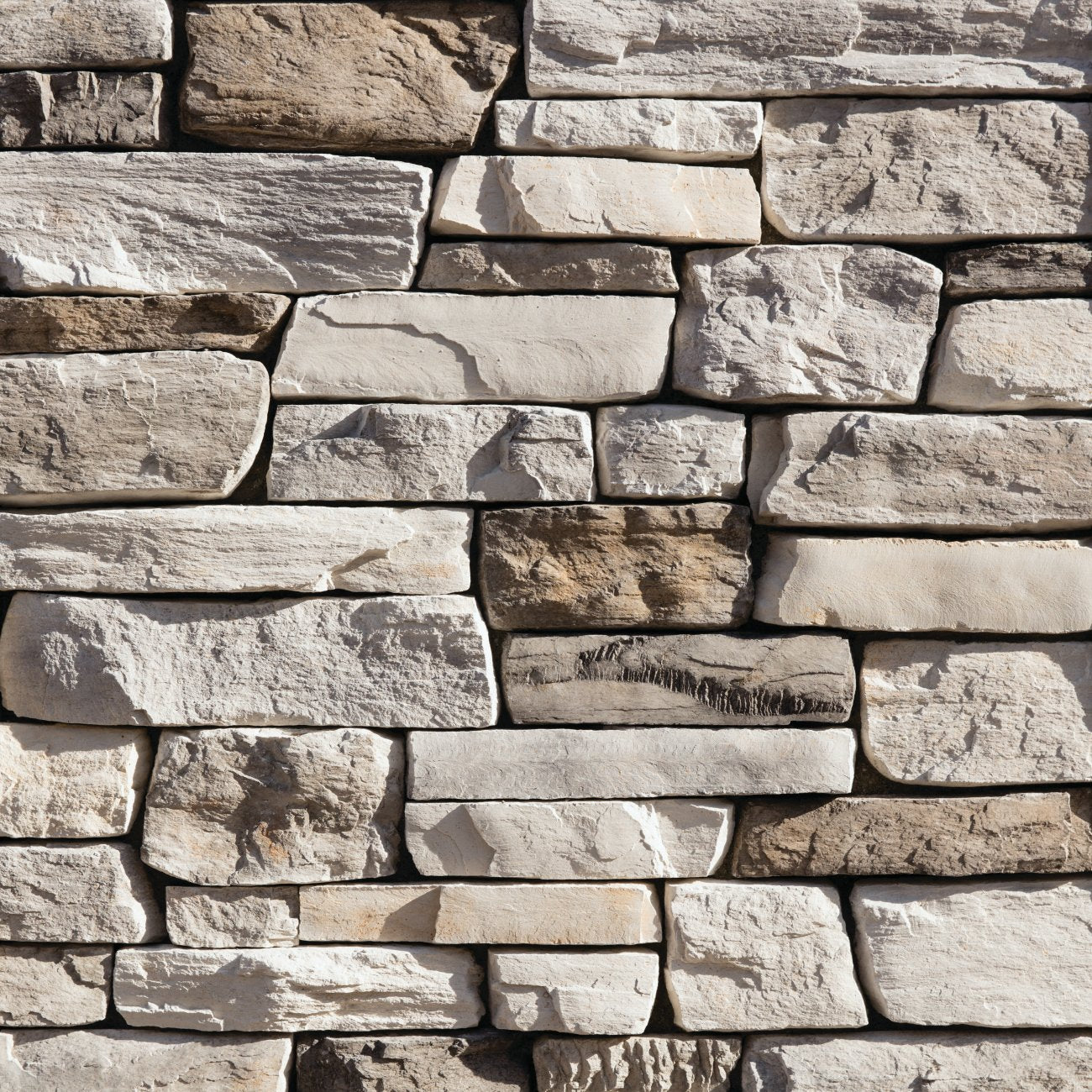 Eldorado Whitebark Cliffstone stone veneer in soft white and gray tones with natural ledgestone texture