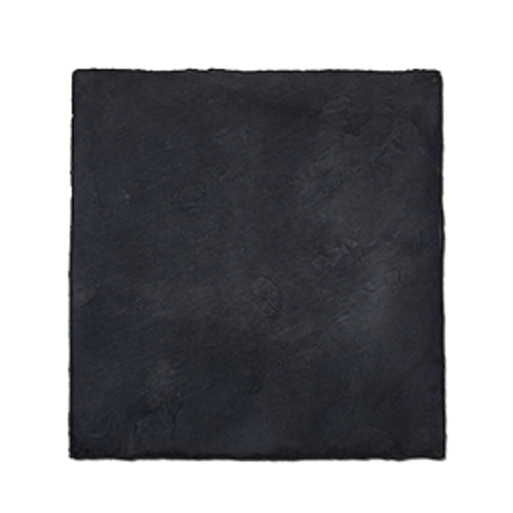 Rectangular stone tile with a textured surface on a black background