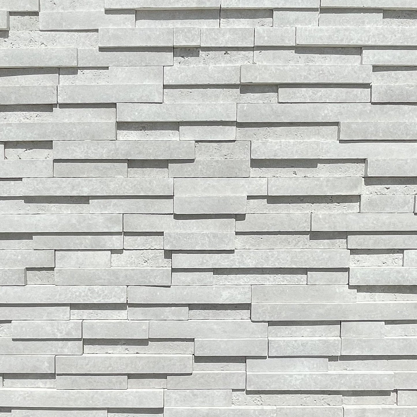 Prestige White Onyx Designer Cut stone veneer with clean linear design