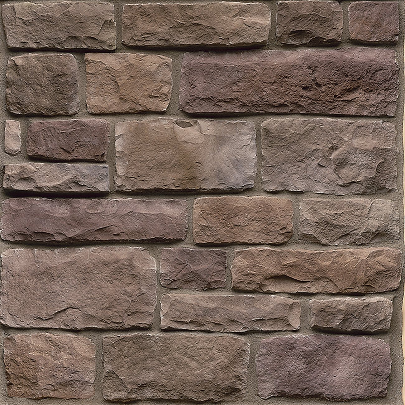 StoneCraft Bucktown Heritage stone veneer featuring warm earth-tone color variation, timeworn textured faces, and classic Old World masonry character.