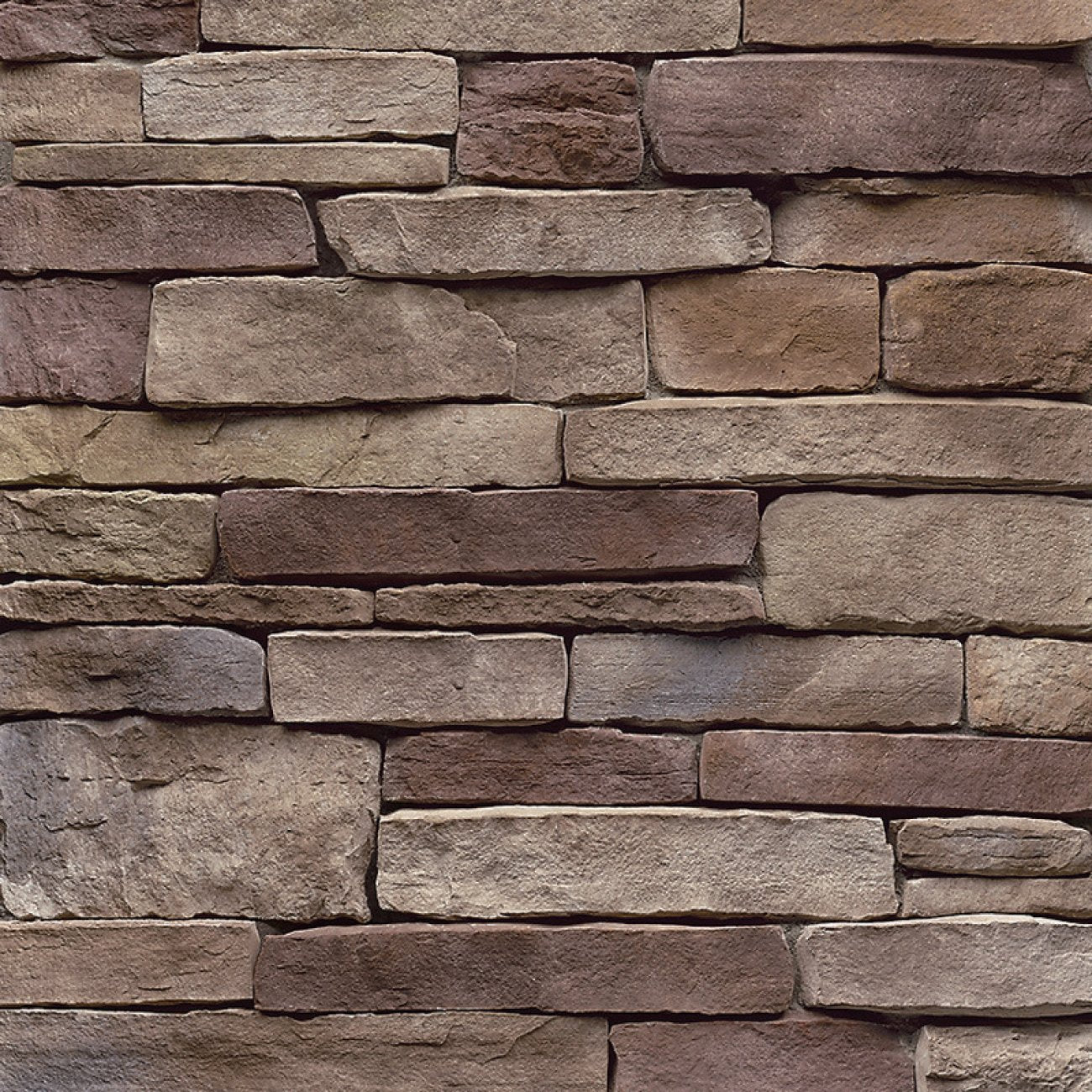 StoneCraft Bucktown Ledgestone stone veneer featuring warm earth tones, layered split-face texture, and dimensional stacked-stone character.