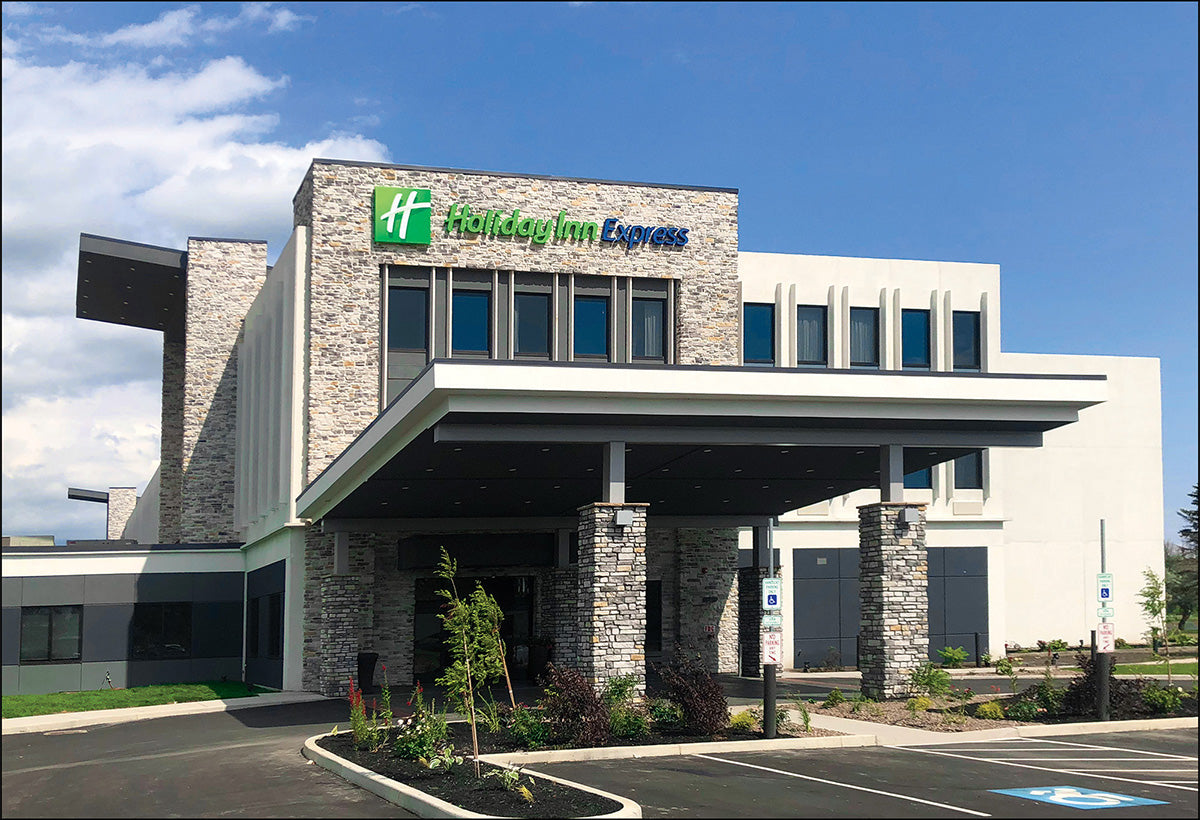 Holiday Inn Express hotel building with clear blue sky