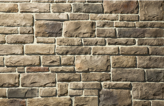 Pattern of stone bricks with varying shades of brown and gray.