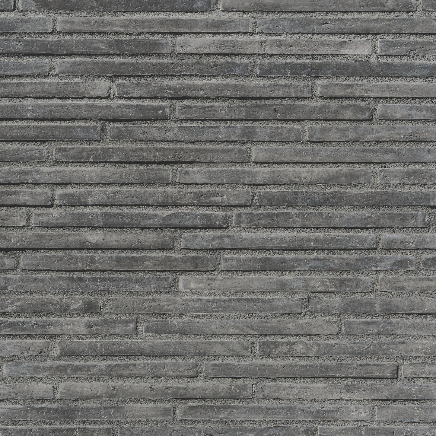 Pattern of gray rectangular stones arranged in a grid