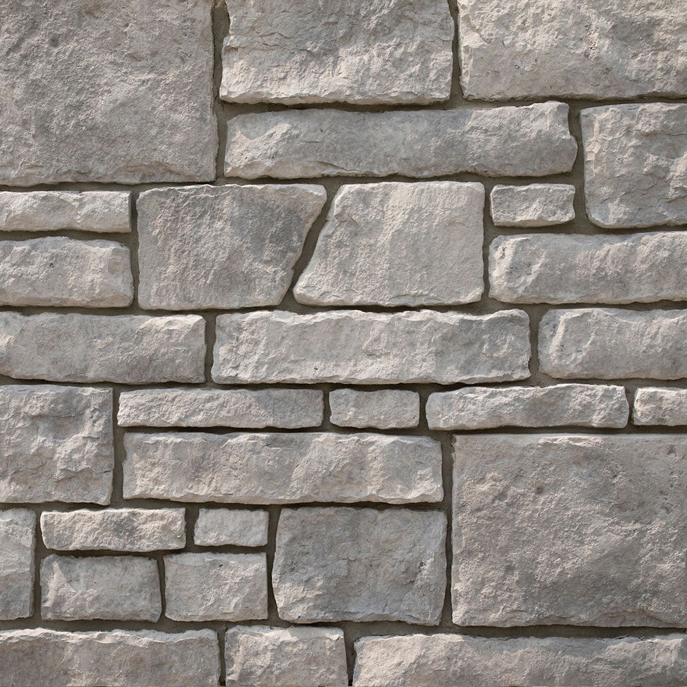 Close-up of a stone wall with gray stones