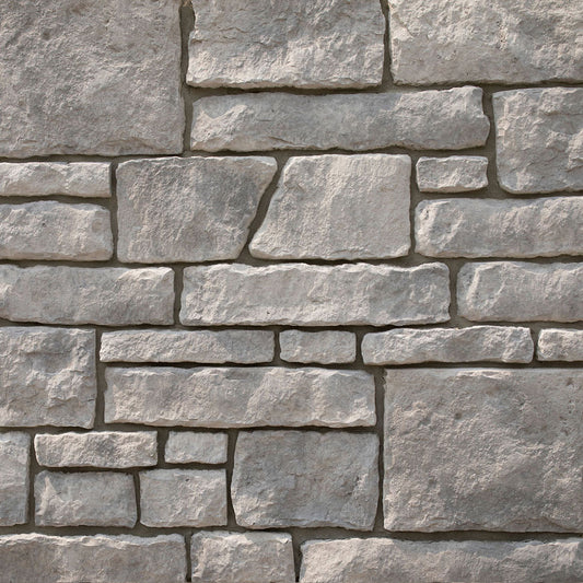 Close-up of a stone wall with gray stones