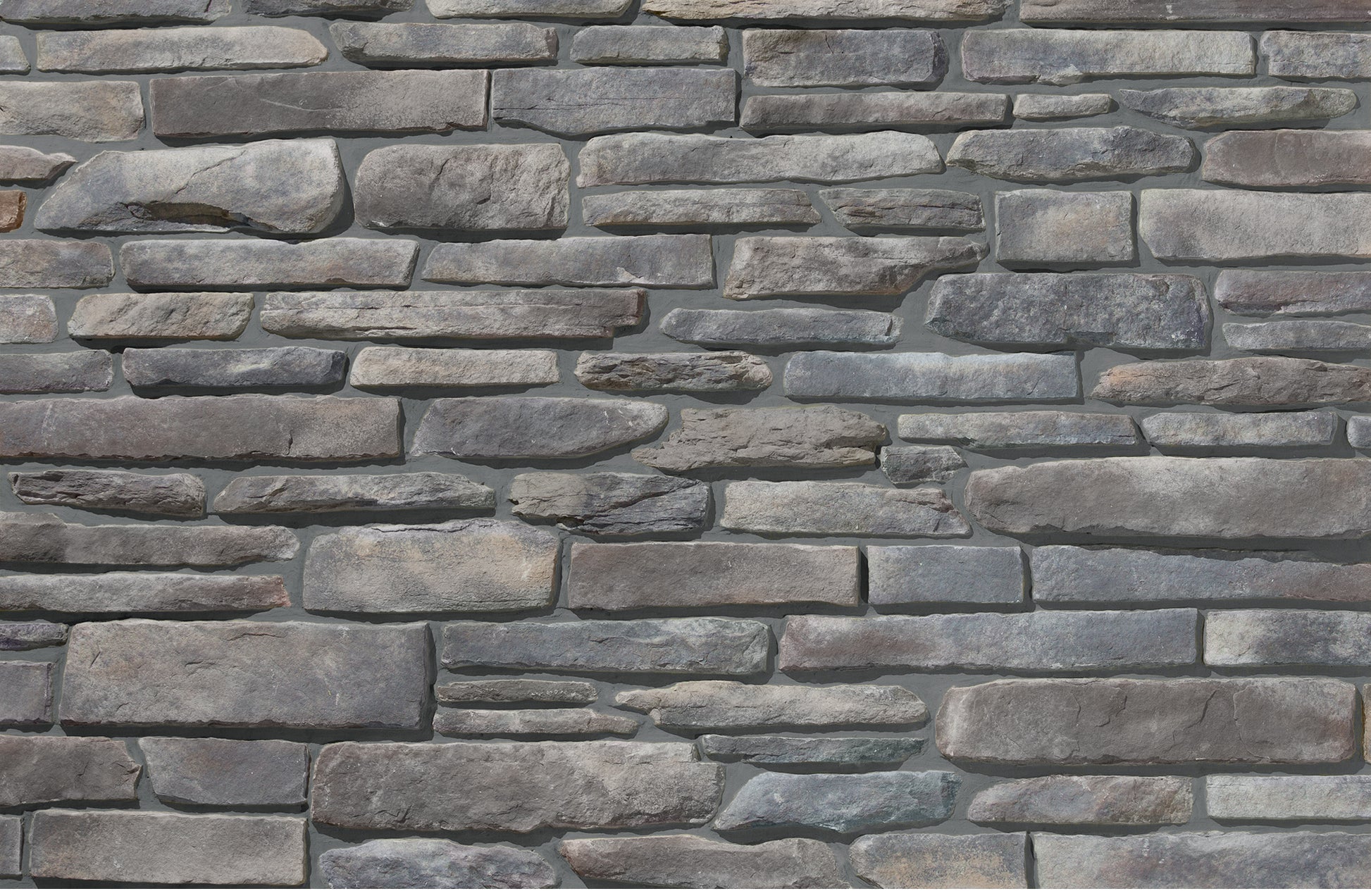 Pattern of stacked stone tiles in various shades of gray.
