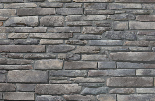 Pattern of stacked stone tiles in various shades of gray.