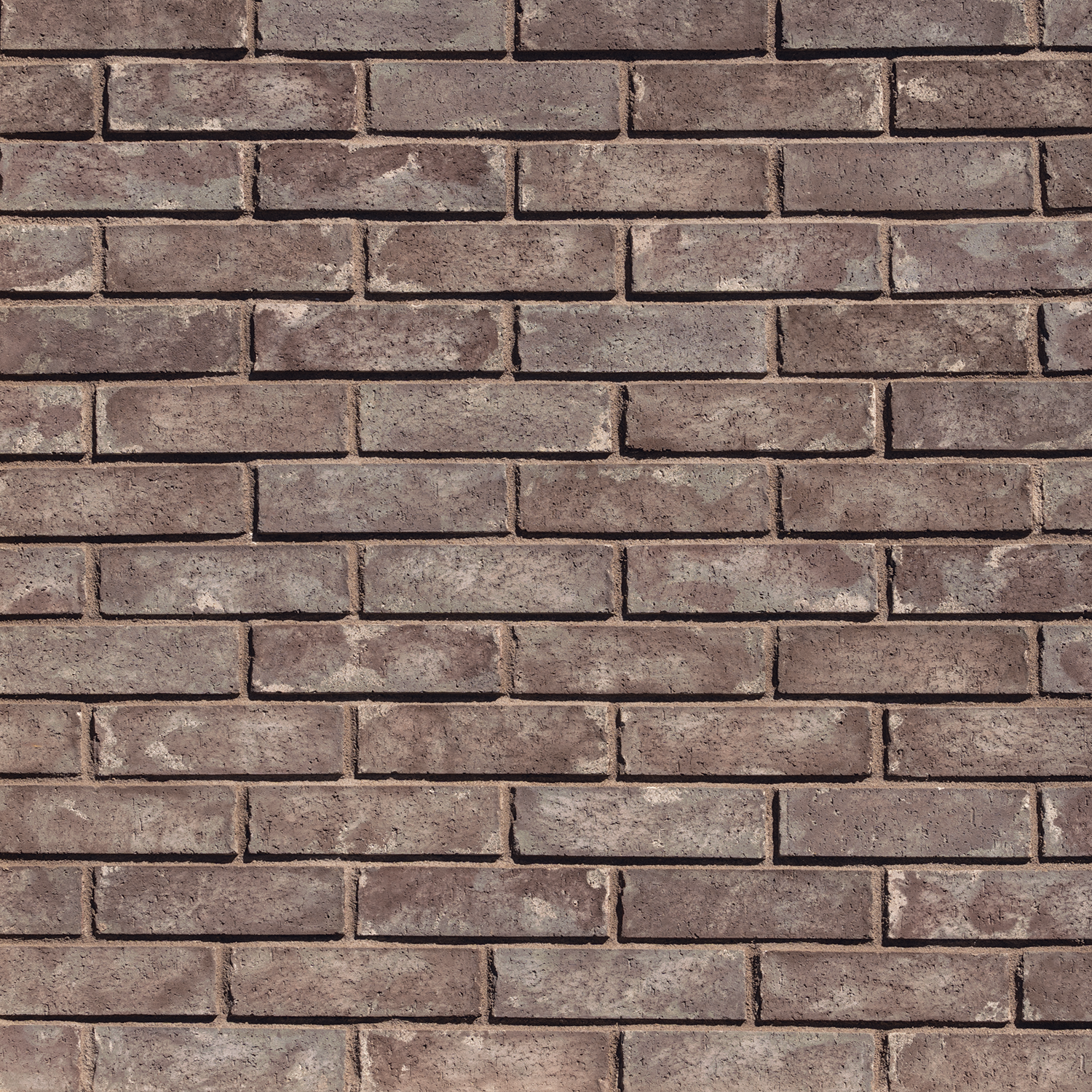 Pattern of brown bricks in a grid layout
