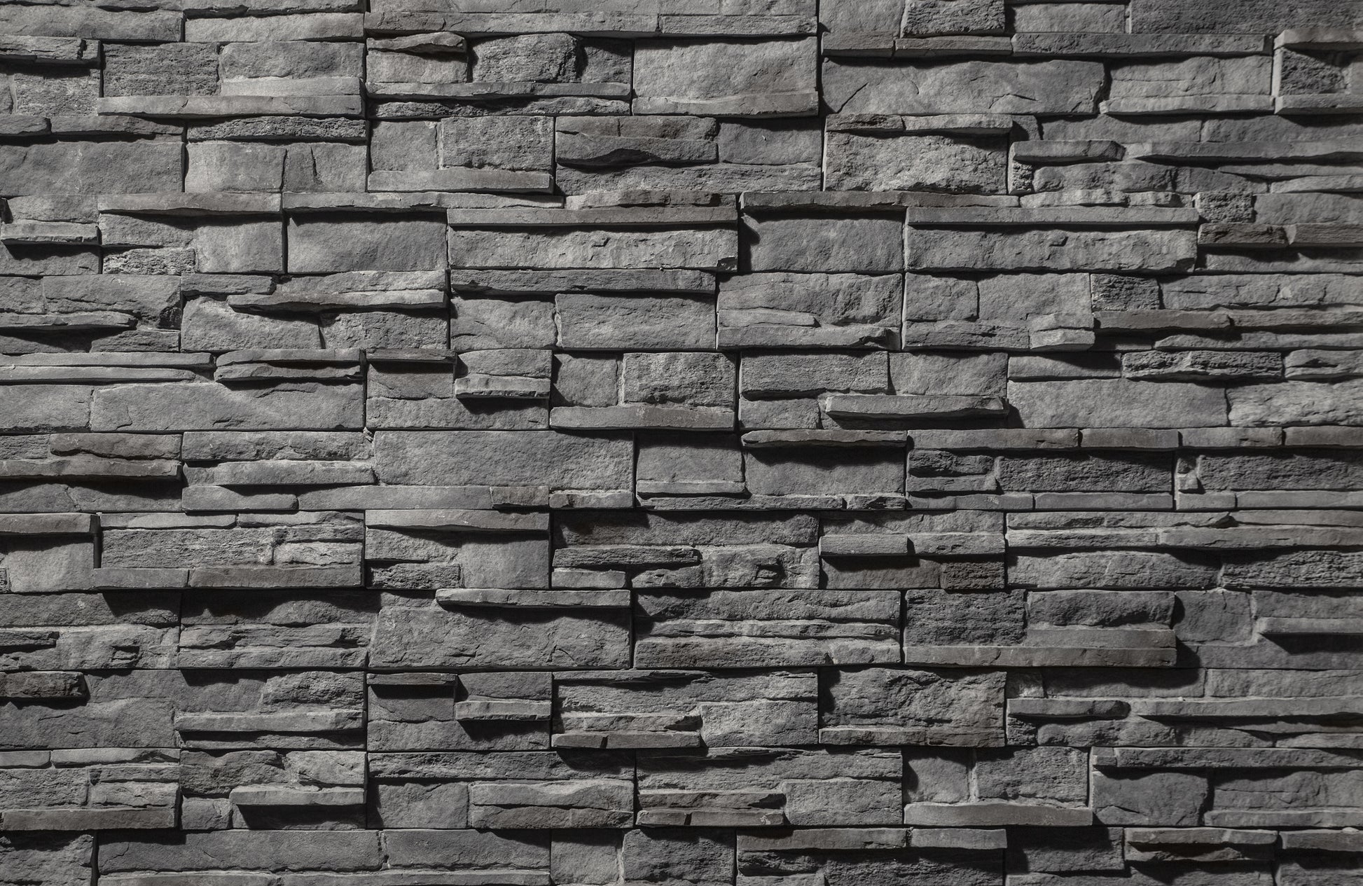 Pattern of stacked stone bricks in a wall