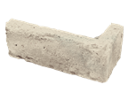 Concrete block with a rough texture on a white background