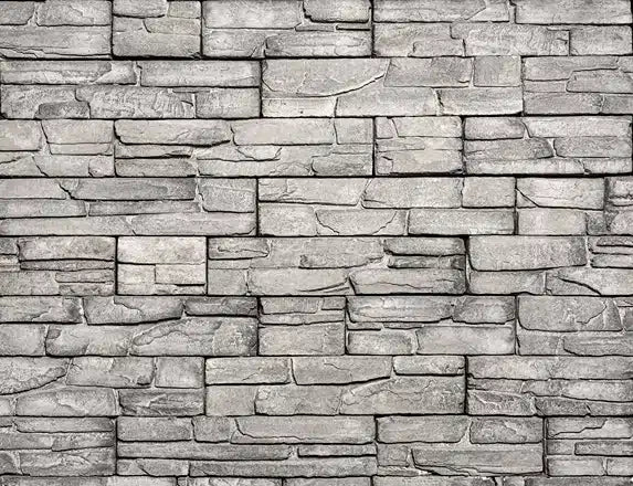 Casa Di Sassi Ardesia Kwik Stack veneer featuring dark slate tones, layered stacked stone profile, and bold modern architectural texture