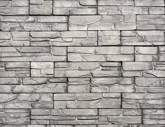 Casa Di Sassi Ardesia Kwik Stack veneer featuring dark slate tones, layered stacked stone profile, and bold modern architectural texture