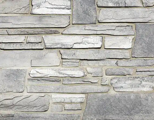 Casa Di Sassi Ardesia Quartz Ledge veneer featuring dark slate-inspired quartz tones, linear stacked stone profile, and bold modern architectural texture