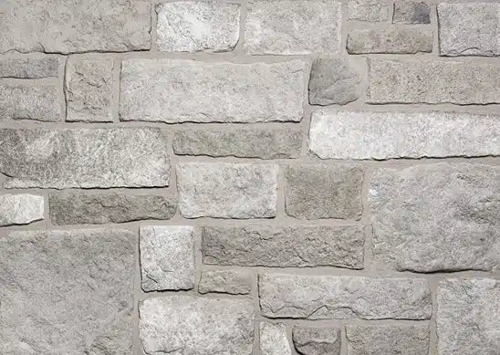 Casa Di Sassi Ardesia Viso Limestone veneer featuring dark slate-inspired limestone tones, refined stone texture, and modern European architectural character.