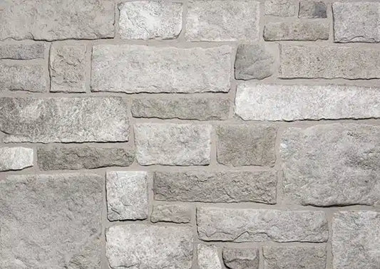 Casa Di Sassi Ardesia Viso Limestone veneer featuring dark slate-inspired limestone tones, refined stone texture, and modern European architectural character.
