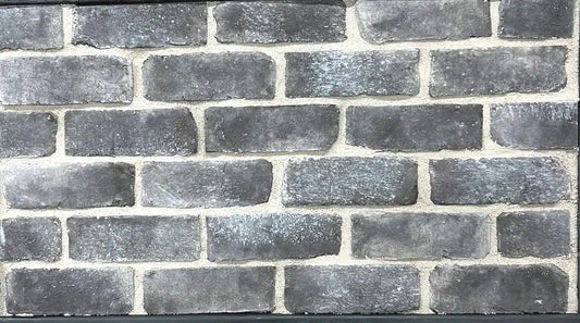 Casa Di Sassi Carbone 1-inch brick veneer featuring deep charcoal tones, slim linear brick format, and modern architectural texture