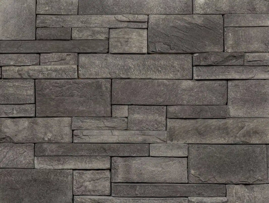Casa Di Sassi Carbone EZ Ledge veneer featuring deep charcoal stone tones, linear stacked stone profile, and bold modern architectural texture.