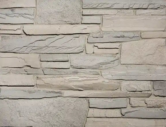 Casa Di Sassi Dente Quartz Ledgestone veneer featuring cool quartz stone tones, sharply defined stacked stone profile, and modern architectural texture