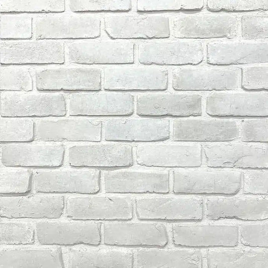 Casa Di Sassi Niveo 1-inch brick veneer featuring warm off-white tones, slim linear brick format, and refined modern texture.