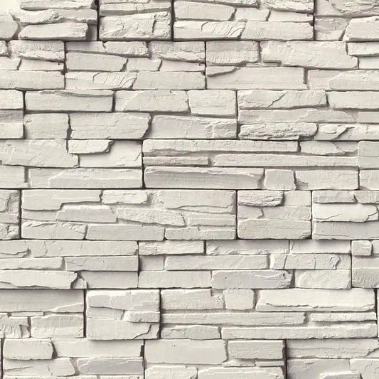 Casa Di Sassi Niveo Kwik Stack veneer featuring soft off-white stone tones, layered stacked stone profile, and clean modern architectural texture.