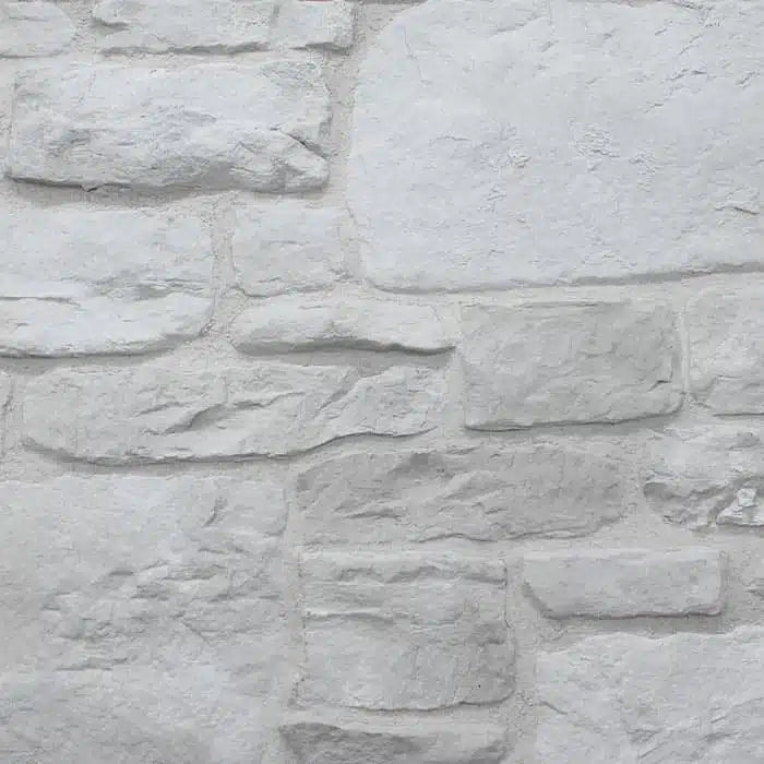 Casa Di Sassi Niveo Old World veneer featuring irregular aged stone shapes, soft white tones, and classic European natural stone texture.