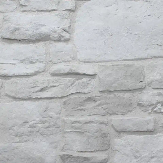 Casa Di Sassi Niveo Old World veneer featuring irregular aged stone shapes, soft white tones, and classic European natural stone texture.