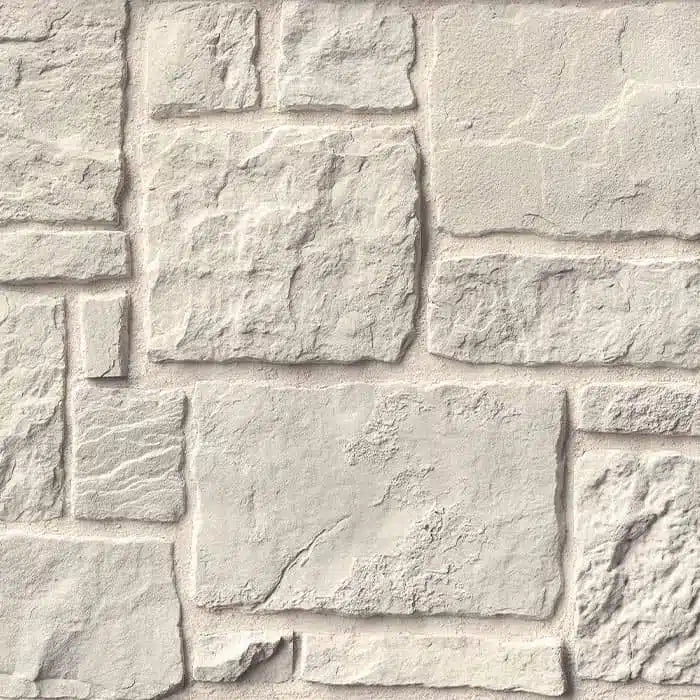 Casa Di Sassi Niveo Volterra veneer featuring soft white stone tones, refined textured surfaces, and classic European masonry character.